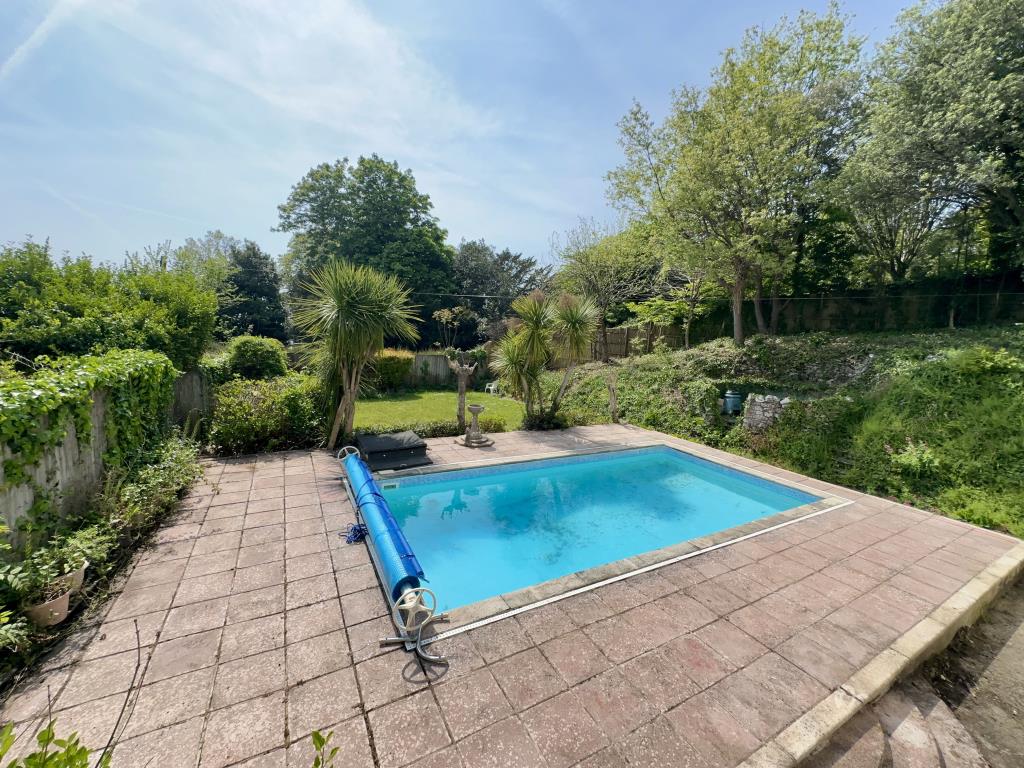 Lot: 128 - UNIQUE DETACHED PROPERTY FOR REFURBISHMENT WITH POTENTIAL - General view of pool and rear gardens of Rockwood House